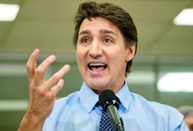 Prime Minister Justin Trudeau answers questions at a news conference in Calgary on Wednesday, March 13, 2024.