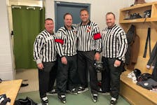 On March 10, Brian Lambert (second from left) and Sheldon Keough (second from right) worked their first Newfoundland Growlers game as referees when a snowstorm meant the scheduled ECHL referee couldn’t get into St. John’s. They were joined on that first game by Jim Vail (left) and Joe Maynard. Jeff Parsons/Newfoundland Growlers