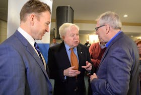 The only three presidents of the FFAW speak after Keith Sullivan was elected. From left to right are Sullivan, Richard Cashin and Earl McCurdy.

Photo by Keith Gosse/The Telegram