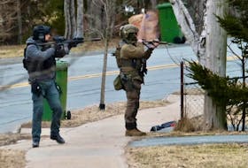 Members of the RCMP and Halifax Regional Police emergency response teams were on Montague Road Friday afternoon, where an individual was barricaded in a home. - Tim Krochak
