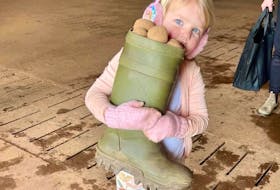 Three P.E.I. Farmers have raised $3,200 in cash and food items to local food banks and given out thousands of pounds of free potatoes during the second annual Fill Your Boots event on March 9. Contributed