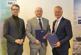 Jannes Elfgen, left, Head of Port Energy Solutions, Scott Penney, Port of Argentia CEO, and Jens Meier, Hamburg Port Authority CEO, posed after a letter of intent was signed to support the hydrogen trade between Canada and Germany.