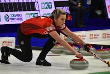 Team Canada’s Emma Miskew prepares for her first delivery of the game against Team United States during the World Women’s Curling Championship at Centre 200 in Sydney on Sunday. Miskew and the Canadians will be on the ice on Tuesday against Italy and Switzerland. JEREMY FRASER/CAPE BRETON POST