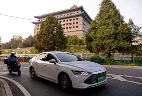 BYD's electric vehicle (EV) Qin moves on a street in Beijing, China October 31, 2023.