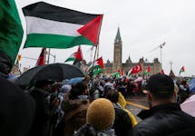 Protesters hold Palestinian flags during a rally to call for a ceasefire, amid the ongoing conflict between Israel and the Palestinian Islamist group Hamas in Gaza, on Parliament Hill in Ottawa, Ontario, Canada March 9, 2024.