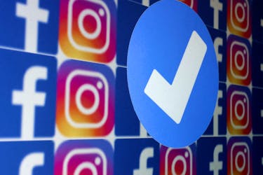 A blue verification badge and the logos of Facebook and Instagram are seen in this picture illustration taken January 19, 2023.