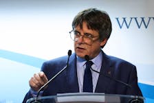 Catalan separatist leader Carles Puigdemont delivers a statement after a deal was signed with Spanish Socialist Workers' Party (PSOE) for Spanish government support, which is expected to include an amnesty law for Catalan separatist activists, in Brussels, Belgium November 9, 2023. 