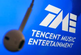 The logo of China's Tencent Music Entertainment Group is seen next to an earphone in this illustration picture taken March 22, 2021.