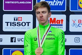 Cycling - UCI World Championships 2023 - Glasgow, Scotland, Britain - August 6, 2023  Bronze medallist Slovenia's Tadej Pogacar is seen on the podium after the men's elite road race