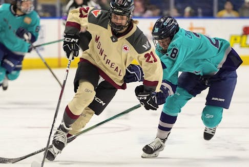 Ottawa's PWHL team acquired forward Tereza Vanisova from Montreal in exchange for defender Amanda Boulier in one of two trade deadline transactions on Monday, March 18, 2024. Vanisova (21) drives past New York's Micah Zandee-Hart (28) during the second period of a PWHL hockey game, in Bridgeport, Conn., on Wednesday, March 6, 2024. 