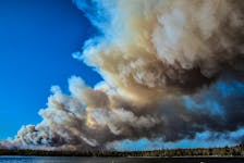 Thick smoke billowed from a wildfire in Barrington, N.S., on May 27, 2023. The Barrington Lake fire burned out of control for weeks. FRANKIE CROWELL PHOTO