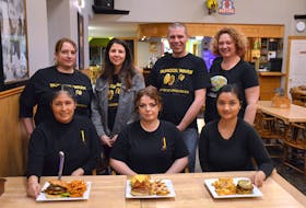 Some of the members of Team Burger Wars were on hand to help choose this year’s burger entry for the Burger Wars campaign recently at the Capitol Pub in Middleton. Front row, from left, are chefs Geovanna Vicens, Holly Hall and Sushmita Tuladhar. Second row, Team Burger Wars members Danielle West, Brannigan Bowlby, Josh West and Laura Churchill Duke.  
- Lawrence Powell • Special to the Annapolis Valley Register