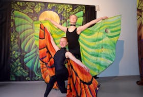 Cadance Academy dancers Lily Matheson-Wood, as the Monarch butterfly, and Odin Jess-Wegleitner, as the Luna moth, prepare to perform as part of artist Holly Carr’s Light in the Forest at Kings County Academy in Kentville. KIRK STARRATT