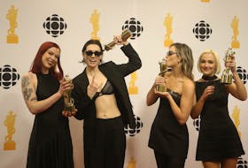The Beaches celebrate winning the rock album of the year at the opening night awards for the Junos, in Halifax Saturday March 23, 2024.

TIM KROCHAK PHOTO