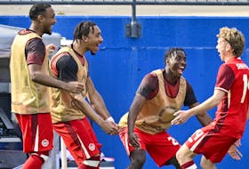 Canada forward Jacob Shaffelburg (right) of POrt Williams celebrates with his teammates after scoring a goal against Trinidad and Tobago during the second half Saturday in Frisco, Texas. - Jerome Miron / USA Today Sports