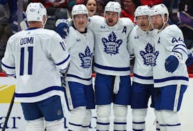 Auston Matthews, centre, of the Toronto Maple Leafs celebrates with teammates after scoring a goal against the Washington Capitals during the first period at Capital One Arena on Wednesday, March 20, 2024, in Washington, D.C. 