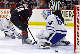 Carolina Hurricanes' Seth Jarvis has his shot deflect wide of Toronto Maple Leafs goaltender Joseph Woll during the second period in Raleigh, N.C., on Sunday, March 24, 2024. 