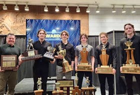 The Charlottetown Islanders handed out annual awards at Eastlink Centre on March 25. From left are Jonathan Oliver, volunteer of the year, Carter Bickle, most valuable player and Colliding Tides Three-Star Award; Marcus Kearsey, scholastic player of the year, class act award, play of the year, player's player of the year and defensive player of the year, Matthew Butler, rookie of the year and fan favourite, Giovanni Morneau, offensive player of the year, and Simon Hughes, hardest-working player. Contributed