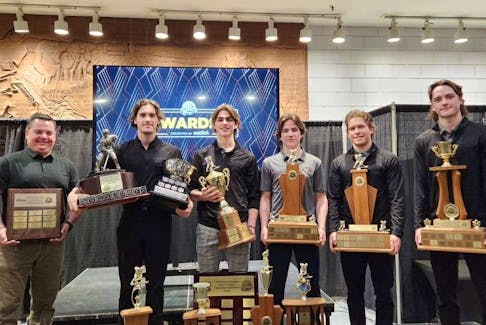 The Charlottetown Islanders handed out annual awards at Eastlink Centre on March 25. From left are Jonathan Oliver, volunteer of the year, Carter Bickle, most valuable player and Colliding Tides Three-Star Award; Marcus Kearsey, scholastic player of the year, class act award, play of the year, player's player of the year and defensive player of the year, Matthew Butler, rookie of the year and fan favourite, Giovanni Morneau, offensive player of the year, and Simon Hughes, hardest-working player. Contributed