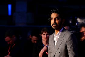 Actor Dev Patel poses as he arrives to attend the European premiere of "The Personal History of David Copperfield" in the BFI London Film Festival 2019, in London, Britain October 2, 2019.