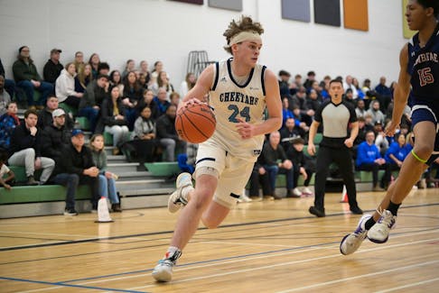 Mason Thurber of the C.P. Allen Cheetahs tries to drive to the hoop in a 2023-24 metro high school boys' basketball league game against the Armbrae Academy Ospreys in Bedford. - Contributed/Facebook