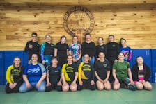 Fighters from all over gathered at the Pictou County Jiu Jitsu Club for the first-ever all-female card in the Maritimes. At the club was, from front, Akira Taylor, left, Kaitlyn Wilcox, Candace Hanifen, Amy Ackles, Fabie Simpson, Valerie Latour, Jen Jennings, Ash Nicholson. In back, Sam Benham, left, Brea Lynn, Katherine Hayes, Charlene Barkhouse, Mary Kauffman, Jaclyn Wilson, Hayley MacLeod, Jenna Hupalo. Nick Gaines