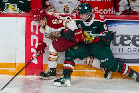 Halifax Mooseheads centre Jake Todd checks Acadie-Bathurst Titan forward Louis-Francois Belanger along the boards during the first period of QMJHL action in Halifax on Wednesday, Nov. 1, 2023.
Ryan Taplin - The Chronicle Herald
