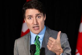 Justin Trudeau speaks to reporters following his meeting with Quebec Premier Francois Legault on Friday March 15, 2024.