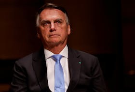 Brazil's former President Jair Bolsonaro reacts at an event at the Municipal Theatre in Sao Paulo, Brazil March 25, 2024.
