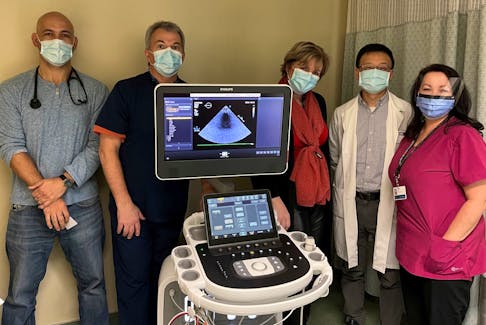Health-care officials gather around the echocardiogram at the Cape Breton Regional Hospital in Sydney. The piece of equipment was purchased through the Cape Breton Regional Hospital Foundation. From left, Dr. David McFarlane, Dr. Paul MacDonald, Raylene McGhee, zone director of DI and cardiac services, Dr. Dongsheng Gao, and Tammy MacKinnon, sonographer. CONTRIBUTED/CAPE BRETON REGIONAL HOSPITAL FOUNDATION