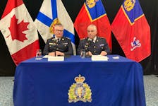 RCMP Commissioner Mike Duheme, right, and Assistant Commissioner Dennis Daley unveil the Mounties' response to the Mass Casualty Commission's final report at a news conference in Millbrook on Wednesday, March 27, 2024. AARON BESWICK