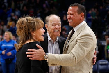 Feb 1, 2023; Minneapolis, Minnesota, USA; Current majority owner of the Minnesota Timberwolves Glen Taylor and his wife Becky Mulvihill greet minority owner Alex Rodriguez (right) after the team defeated the Golden State Warriors at Target Center. Mandatory Credit: Bruce Kluckhohn-USA TODAY Sports