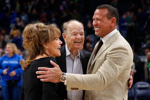 Feb 1, 2023; Minneapolis, Minnesota, USA; Current majority owner of the Minnesota Timberwolves Glen Taylor and his wife Becky Mulvihill greet minority owner Alex Rodriguez (right) after the team defeated the Golden State Warriors at Target Center. Mandatory Credit: Bruce Kluckhohn-USA TODAY Sports