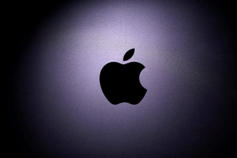 Apple logo is seen on the MacBook in this illustration taken taken April 12, 2020.