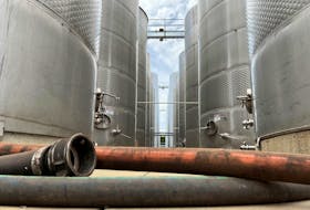 Wine storage tanks are pictured at a Calabria Wines facility in the town of Griffith in southeast Australia, February 26, 2024.