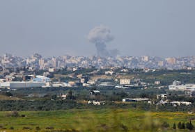 Smoke rises over Gaza following an explosion, amid the ongoing conflict between Israel and the Palestinian Islamist group Hamas, as seen from Israel, March 27, 2024.