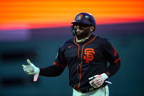 Mar 26, 2024; San Francisco, California, USA; San Francisco Giants third baseman Pablo Sandoval smiles as he is removed for a pinch runner after singling against the Oakland Athletics during the ninth inning at Oracle Park. Mandatory Credit: D. Ross Cameron-USA TODAY Sports/File Photo