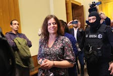 Italian teacher Ilaria Salis, facing charges of taking part in an anti-fascist assault on far-right activists, walks after attending a hearing in a court, in Budapest, Hungary, March 28, 2024.