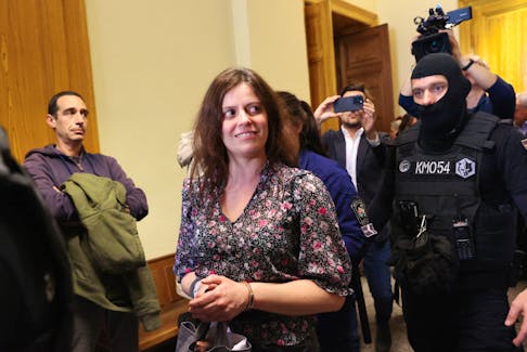 Italian teacher Ilaria Salis, facing charges of taking part in an anti-fascist assault on far-right activists, walks after attending a hearing in a court, in Budapest, Hungary, March 28, 2024.