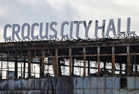 A view shows the burnt-out Crocus City Hall following a deadly attack on the concert venue outside Moscow, Russia, March 26, 2024.