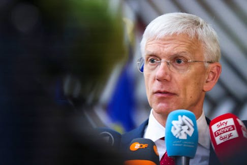 Latvian Foreign Minister Krisjanis Karins speaks to members of the media as he attends a European Union Foreign Ministers' meeting in Brussels, Belgium March 18, 2024.