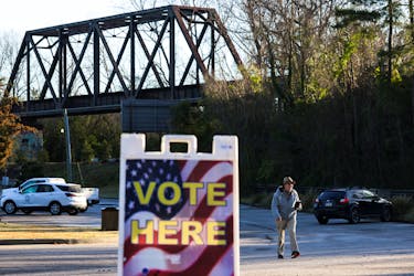 Voters arrive to cast their ballots at the Earlewood Park Community Center during the republican presidential primary in Columbia, South Carolina, U.S., February 24, 2024.