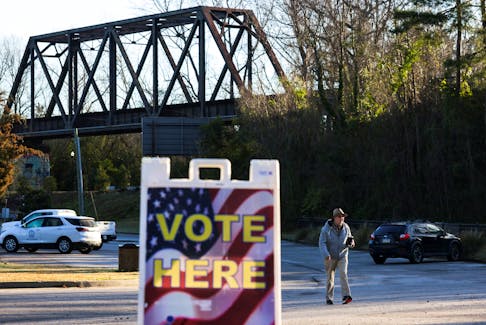 Voters arrive to cast their ballots at the Earlewood Park Community Center during the republican presidential primary in Columbia, South Carolina, U.S., February 24, 2024.