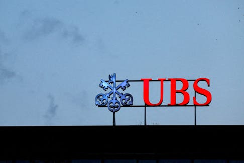 A UBS logo is seen next to Credit Suisse at the Bahnhofstrasse in Zurich Switzerland, August 30, 2023. 