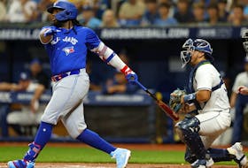 Vladimir Guerrero Jr. of the Toronto Blue Jays hits a 450-foot  home run in the sixth inning against the Tampa Bay Rays at Tropicana Field in St Petersburg on Thursday.