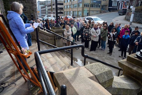 About 100 people attended a vigil on Thursday, March 28, for a woman who was killed in Outer Cove on March 5. The vigil was held on the steps of Newfoundland and Labrador Supreme Court. Keith Gosse • The Telegram