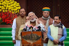India's Prime Minister Narendra Modi speaks with the media inside the parliament premises upon his arrival on the first day of the budget session in New Delhi, India, January 31, 2024.