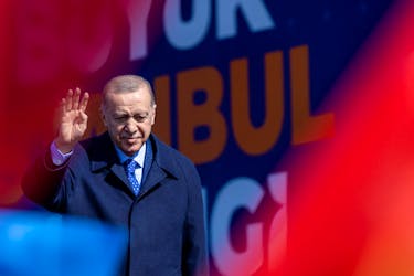 Turkey's President Tayyip Erdogan greets his supporters during a rally ahead of the local elections in Istanbul, Turkey March 24, 2024.