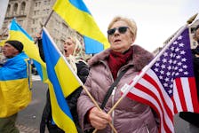Ukraine supporters protest against Russia's invasion of Ukraine during a demonstration near the White House in Washington, U.S., March 1, 2022. 