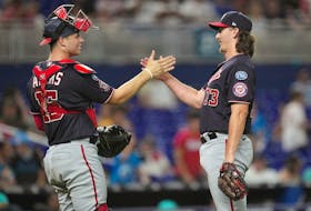 Aug 25, 2023; Miami, Florida, USA; Washington Nationals relief pitcher Hunter Harvey (73) and catcher Riley Adams (15) celebrate a victory over the Miami Marlins at loanDepot Park. Mandatory Credit: Jim Rassol-USA TODAY Sports/ File Photo